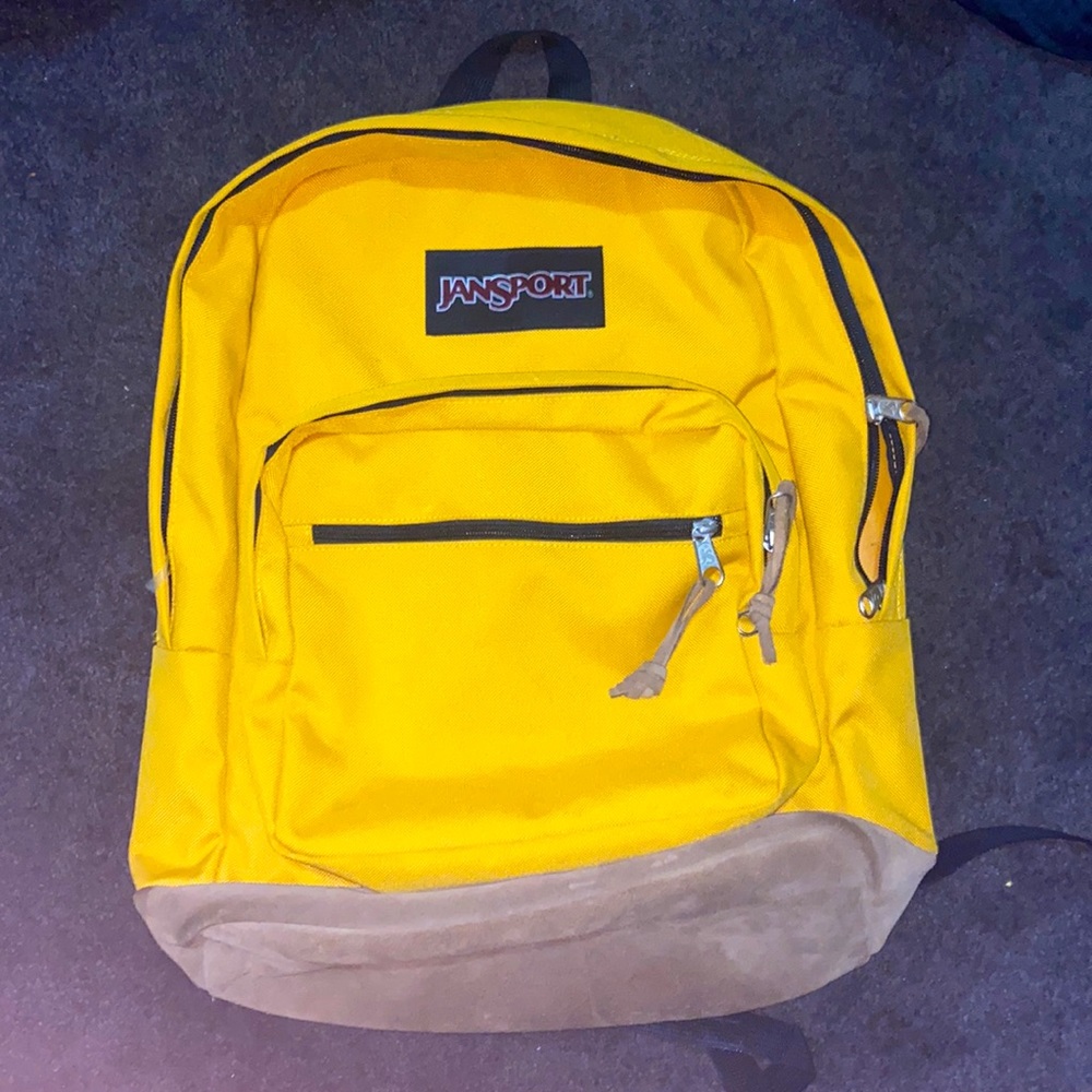 Gold JANSPORT backpack
